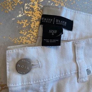 White zippered jeans